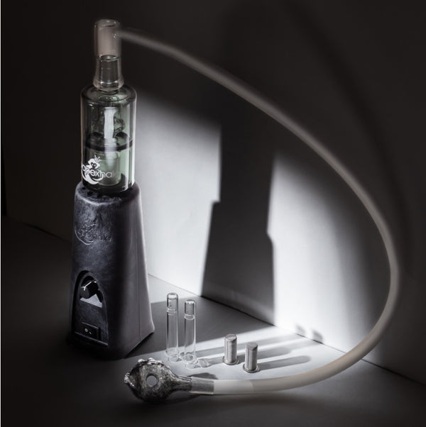 Side view of VapeXhale Cloud EVO Vaporizer with accessories